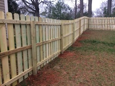 Fence with spaced pickets