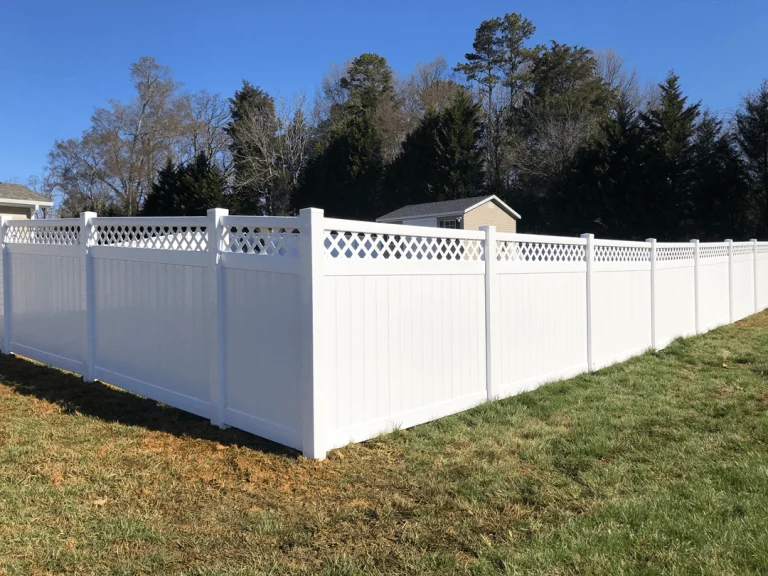 Tall vinyl panels enclosing yard
