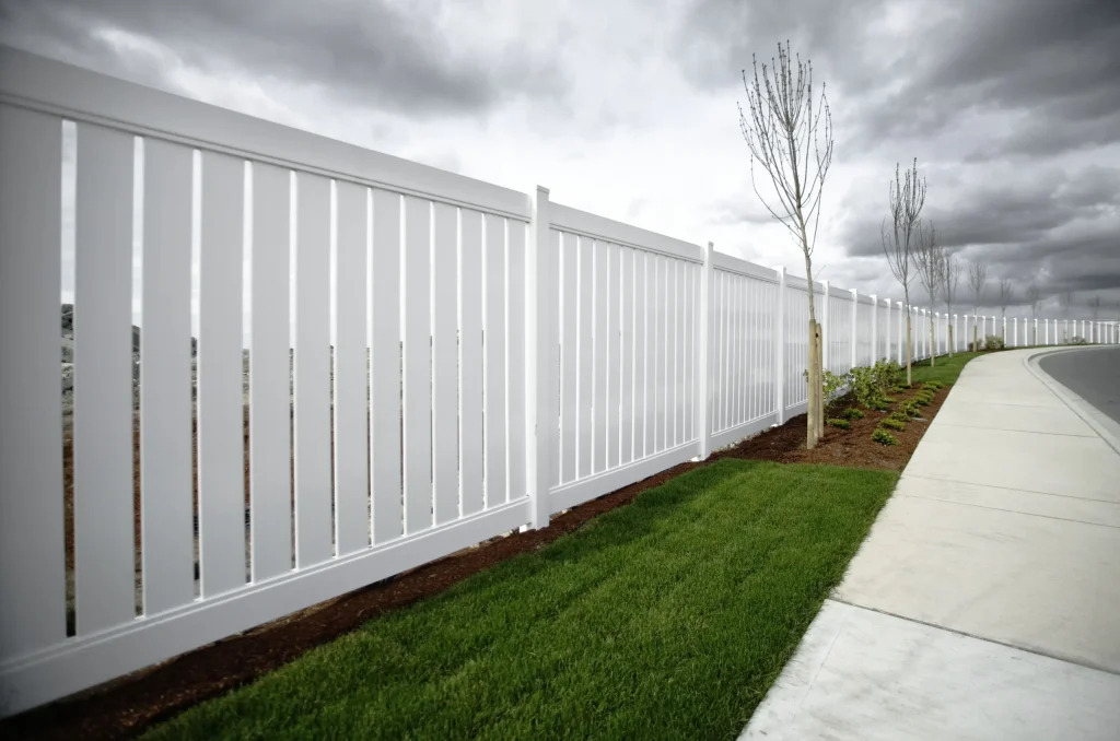 White vinyl backyard privacy fence