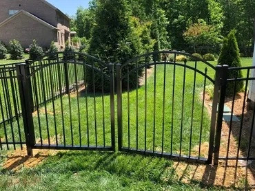 Black aluminum fence with gate