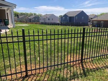 Black aluminum fence backyard