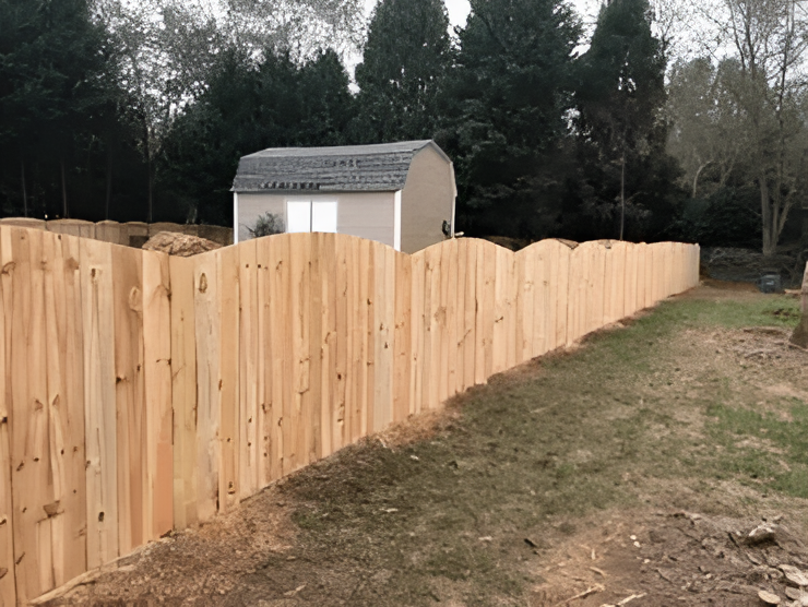 Clamshell planks backyard fence